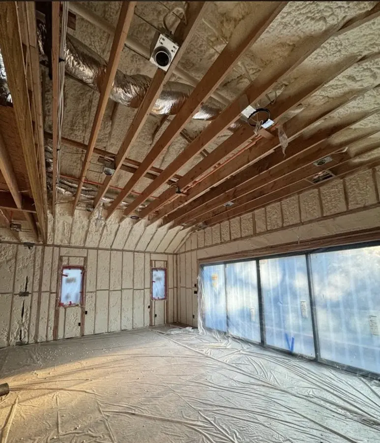 Interior walls and ceiling insulated with spray foam during new construction in Aquia Harbour